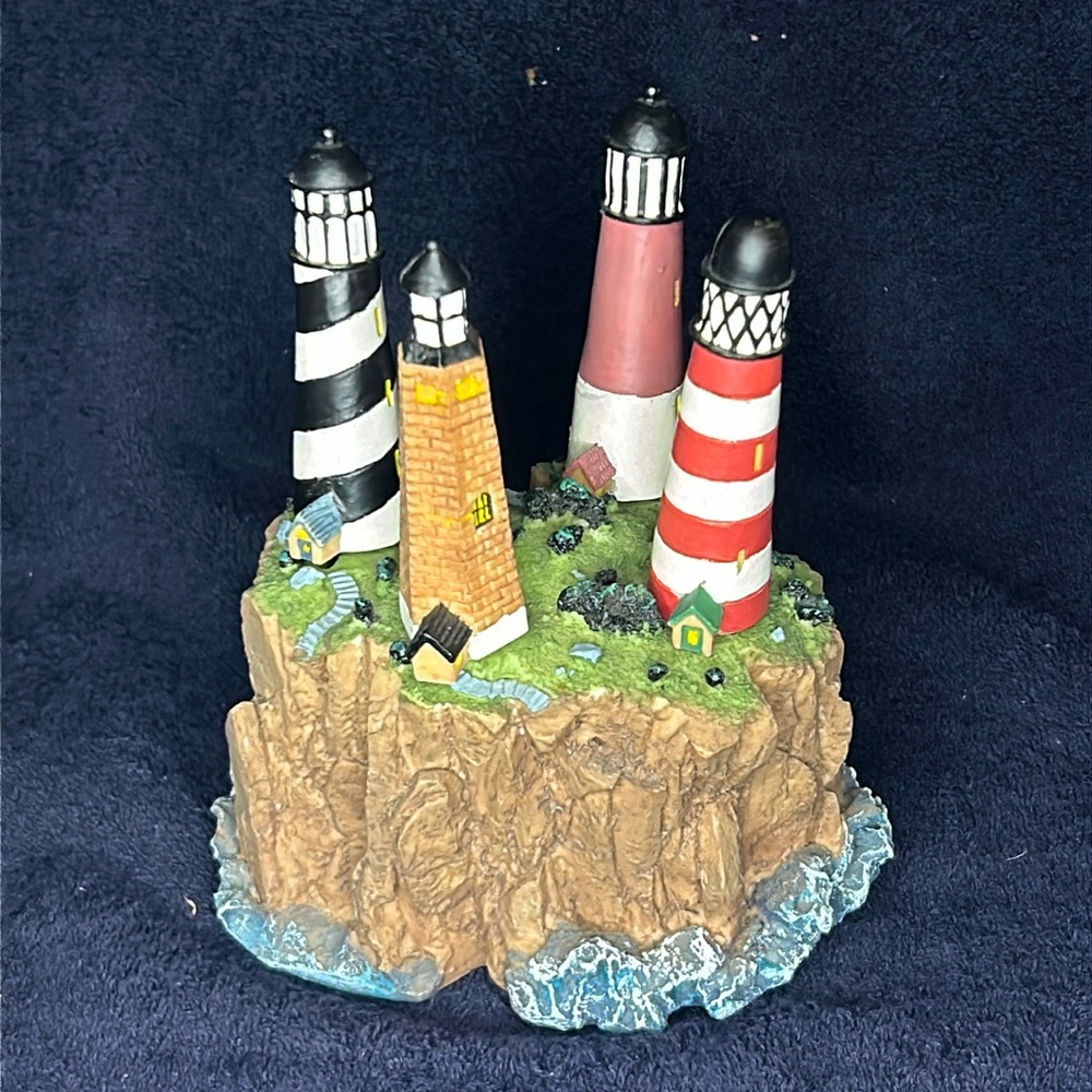 Cheese & Dip Knife Set. 4 Lighthouses nest into a resin base
